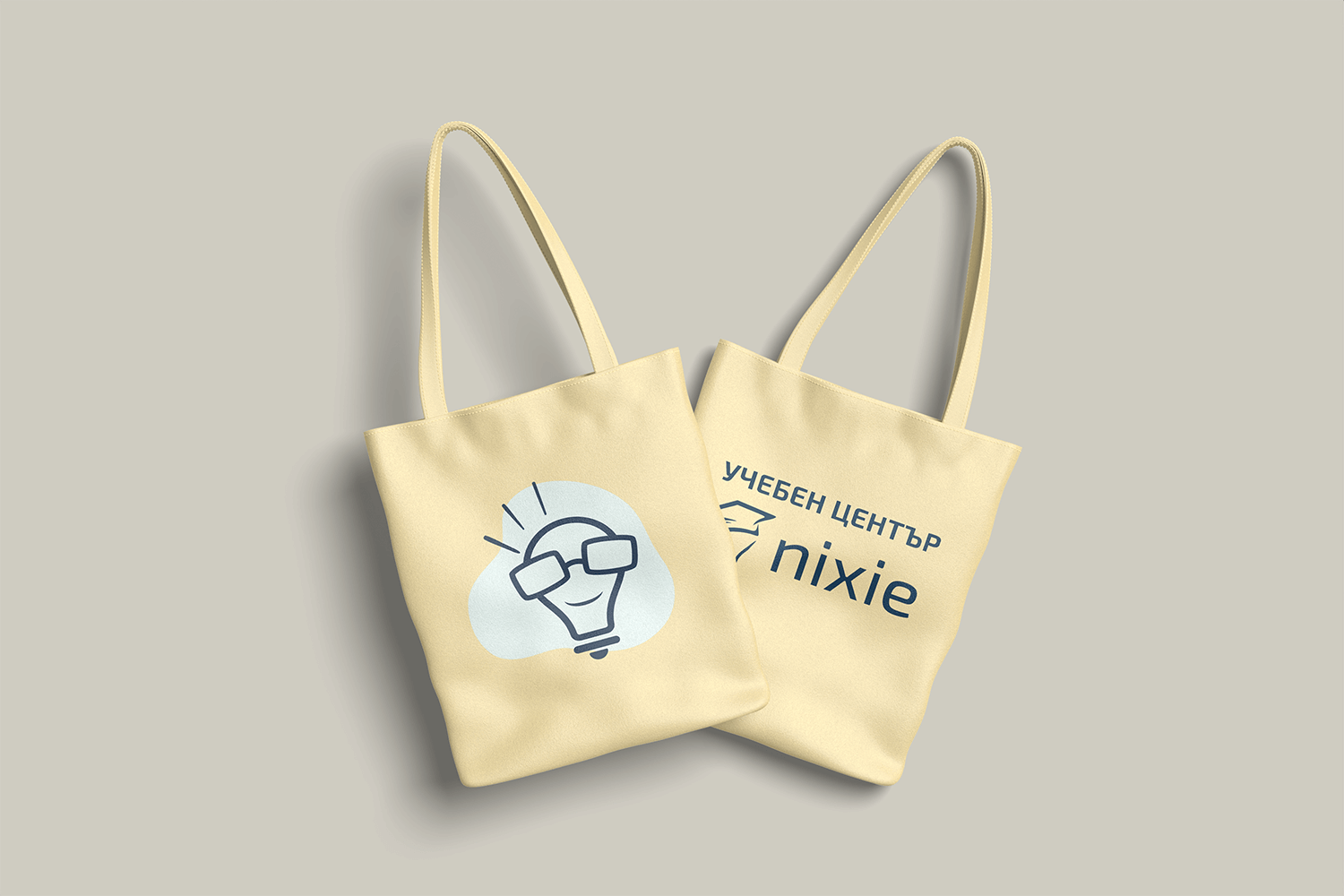 Текстилни чанти с логото и образователните илюстрации на NIXIE